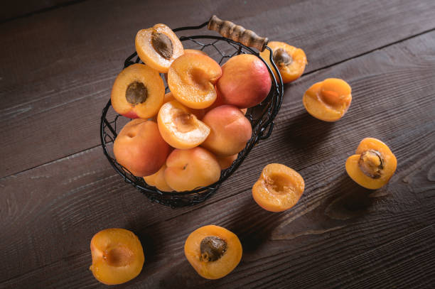 istock Delicious ripe apricots in a bowl 1151314072
