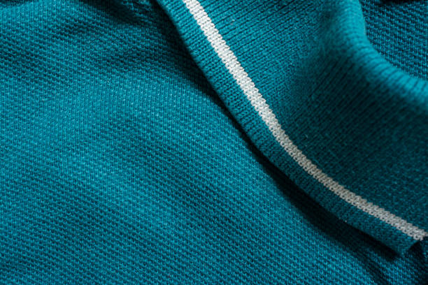 istock Green polo shirt texture, cotton fabric. Textile background 1151319266