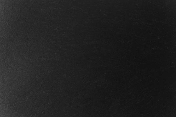 istock Abstract background of black slate stone texture and pattern 1151321883