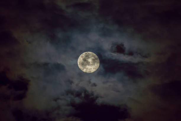 istock The full moon in the dark cloud. 1151322372