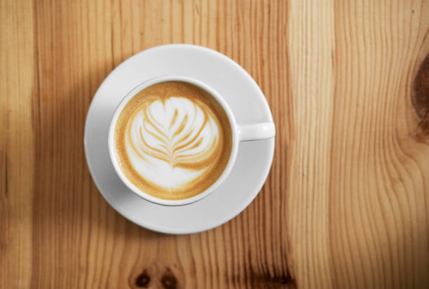 istock White cups of tasty cappuccino. 1151323322