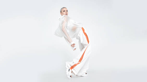 istock Sensual futuristic lady dancing and looking away 1151328080