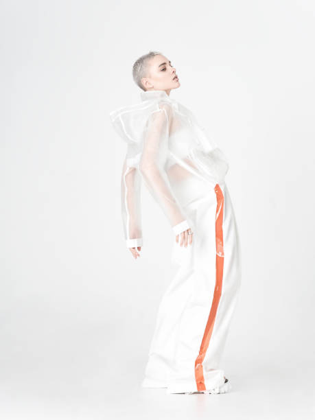 istock Model in futuristic outfit bending back 1151328083