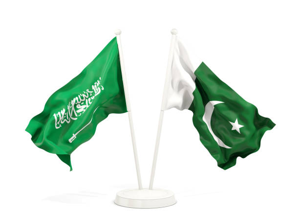 Two waving flags of Saudi Arabia and pakistan isolated on white stock photo