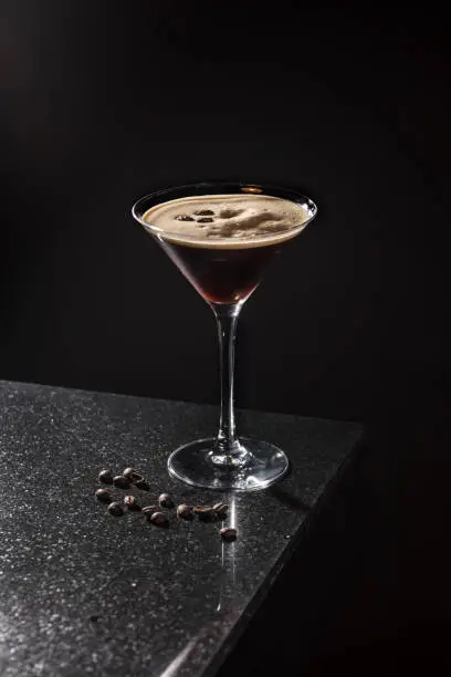 espresso martini cocktail on black background