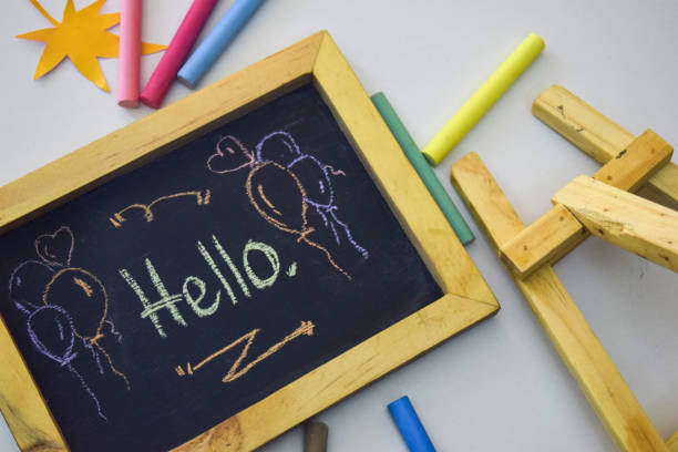 istock Hello on the blackboard isolated white background 1151334150