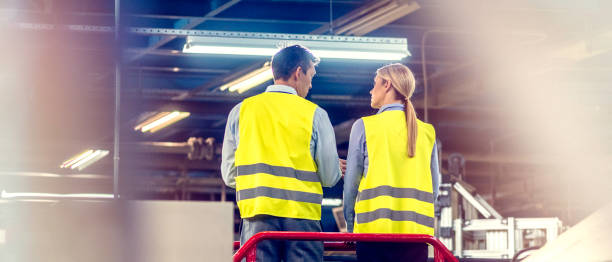 istock Two engineers in automated factory 1151336987