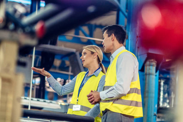 istock Two engineers in automated factory 1151336999