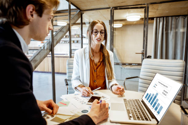 istock Man and woman working in the office 1151339937