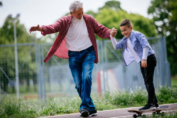 istock Little boy trying skateboard 1151342353