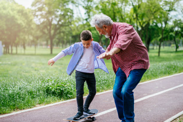 istock Little boy trying skateboard 1151342511