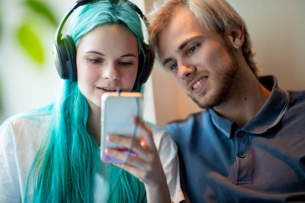 istock Couple watching funny clips on phone 1151345073