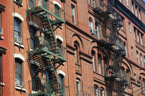 istock block and fire escape in lower east manhatttan 1151348152