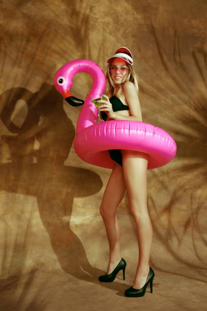 istock Beautiful girl isolated on braun studio background 1151352588