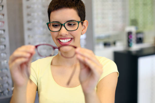 istock Young woman buying new eyewear 1151358823