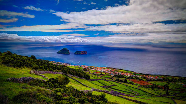 Sea view to Cabras islet, Terceira island, Azores, Portugal Sea view to Cabras islet near Terceira island, Azores, PortugalSea view to Cabras islet near Terceira island, Azores, Portugal terceira azores stock pictures, royalty-free photos & images