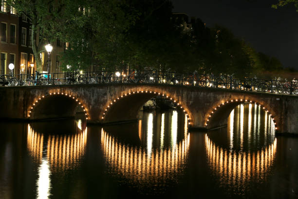 istock Bridge at Night in Amsterdam, Netherlands 1151362711