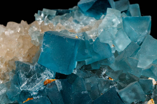 istock macro mineral fluorite stone on black background 1151363722