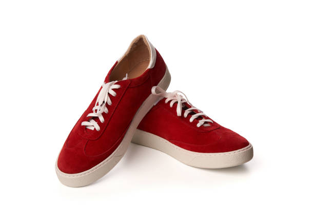 istock Red casual suede shoes isolated on white 1151367166