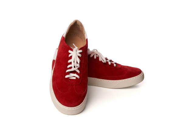 istock Red casual suede shoes isolated on white 1151367530
