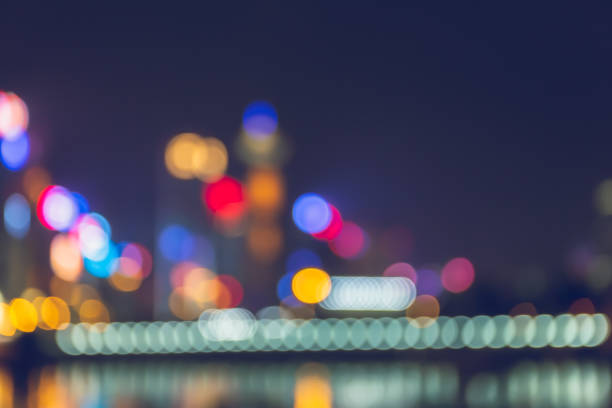 istock Light night city bokeh abstract background 1151367619