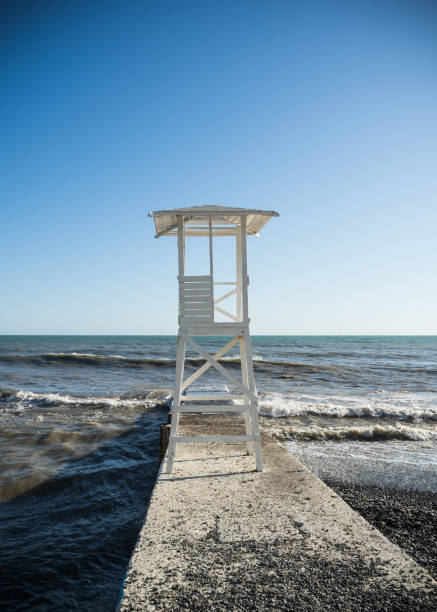 istock White wooden rescue tower on the beach 1151367857