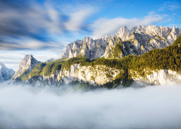 Stunning image of alpine lake Vorderer Gosausee. Picturesque and gorgeous morning scene. Salzkammergut is a located in the Gosau Valley in Upper Austria. Dachstein glacier. Explore the world's beauty.