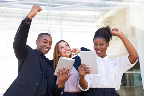 istock Excited entrepreneurs satisfied with sales results 1151367889