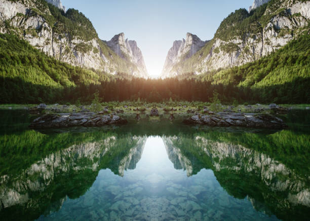 Stunning image of alpine lake Vorderer Gosausee. Double exposure effect. Salzkammergut is a located in the Gosau Valley in Upper Austria. Dachstein glacier. Explore the world's beauty.
