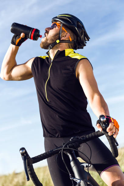 istock Handsome young man taking a break after a cycling training session. 1151375261