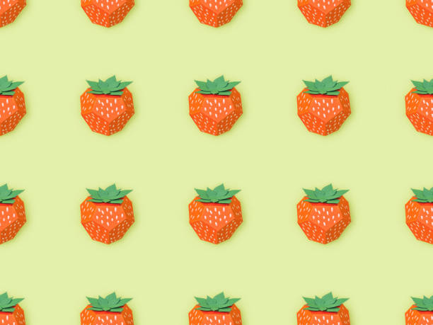 istock top view of pattern with handmade paper strawberries isolated on yellow 1151382037