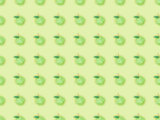 istock top view of pattern with arranged handmade paper apples isolated on green 1151382078