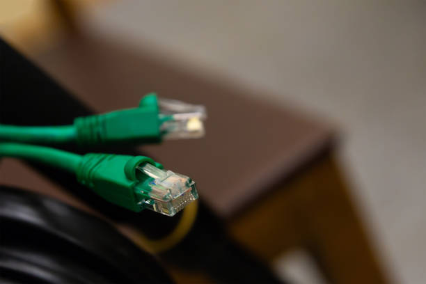 istock transparent connector information transfer connector, networking, green wires rj-45 design basis internet 1151382402