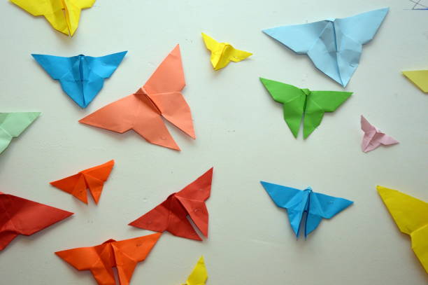 istock Paper Butterflies on a white wall 1151385135