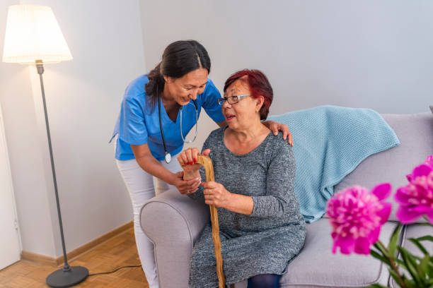 istock Older woman with a nurse 1151388465