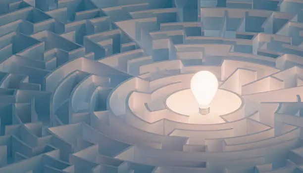 Circular maze or labyrinth with light bulb in its center. Puzzle, riddle, intelligence, thinking, solution, IQ concepts. 3d render illustration.