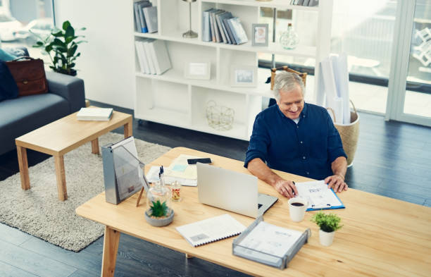 istock Going through paperwork and checking what needs his signature 1151392096