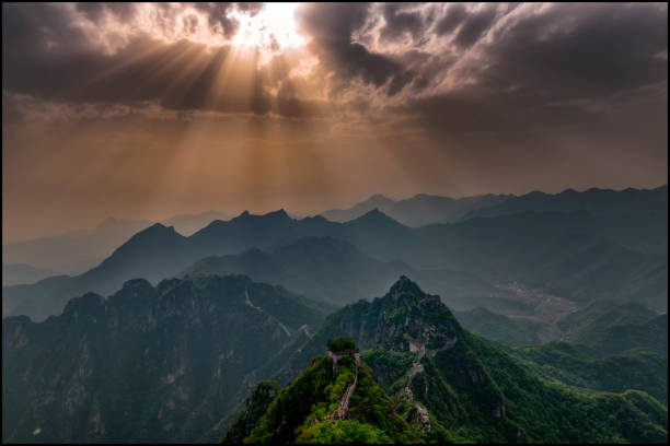 istock Sunbeams Breaking through the Clouds at the Great Wall 1151394108