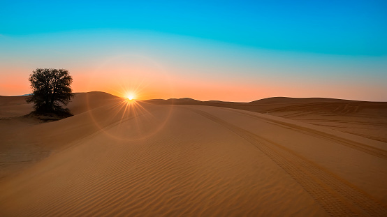 Desert Sunrise with sand doom