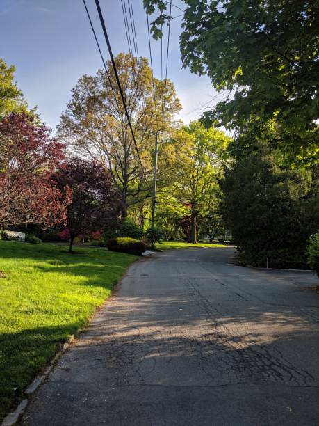 istock Quaint Rural Street in New York in Spring 1151397111