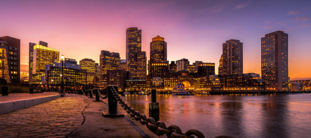 boston skyline at sunset boston skyline at sunset boston skyline night skyscraper stock pictures, royalty-free photos & images