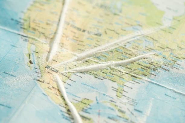 istock Selective focus of cocaine on colorful world map 1151398897