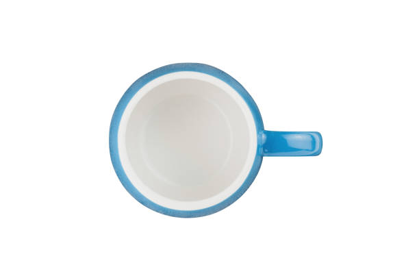 istock Single blue empty ceramic cup for drinks or other liquid products isolated on white background. Top view 1151400550
