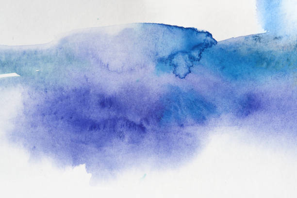 istock blue texture watercolor on paper, wet with paint overflows. on white background isolated 1151400943