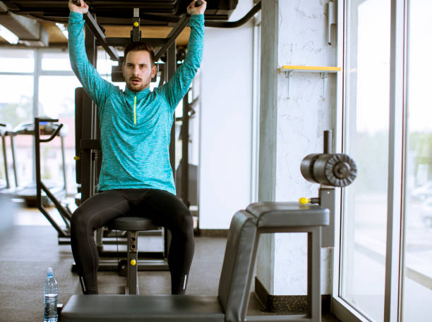 istock Adult man work out in training gym 1151401236