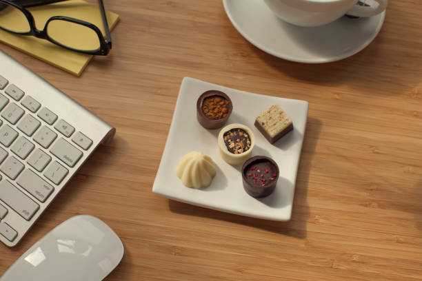 istock Appreciation. Gift of gourmet chocolates at work. 1151403018