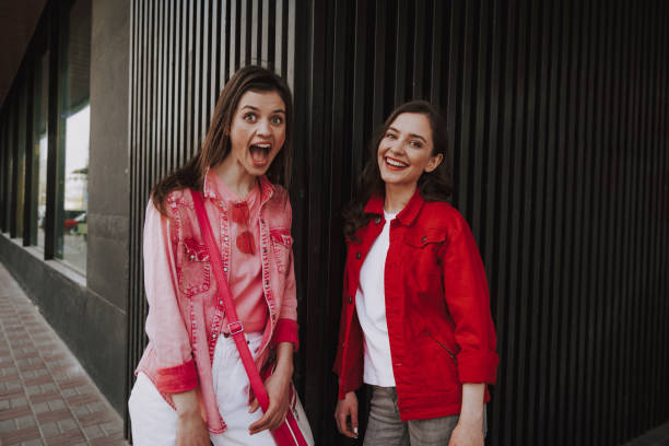 istock Two happy hipster girls having fun together 1151404928