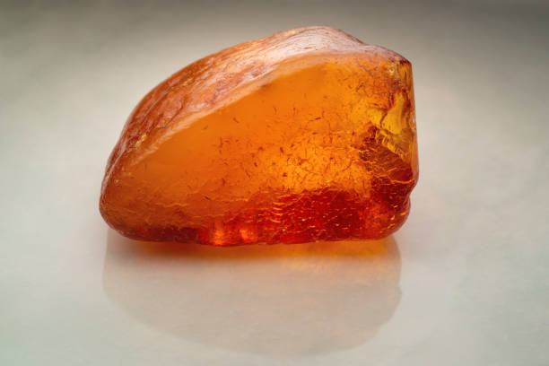 istock Red yellow amber stone piece 1151406379