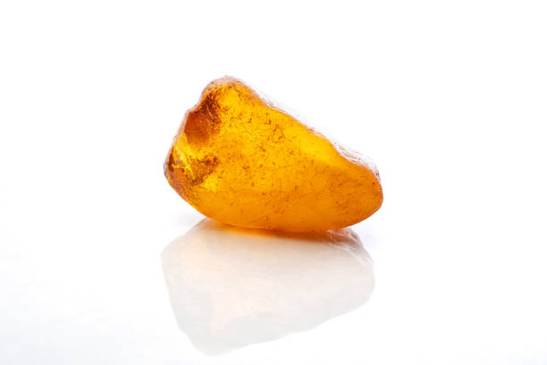istock Red yellow amber stone piece 1151406608