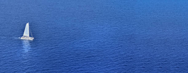 istock panoramic view on a sailboat in dark blue sea in summer 1151408207
